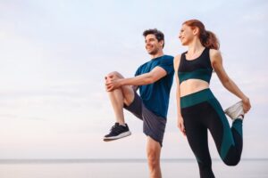 A pair of athletes getting ready for a run